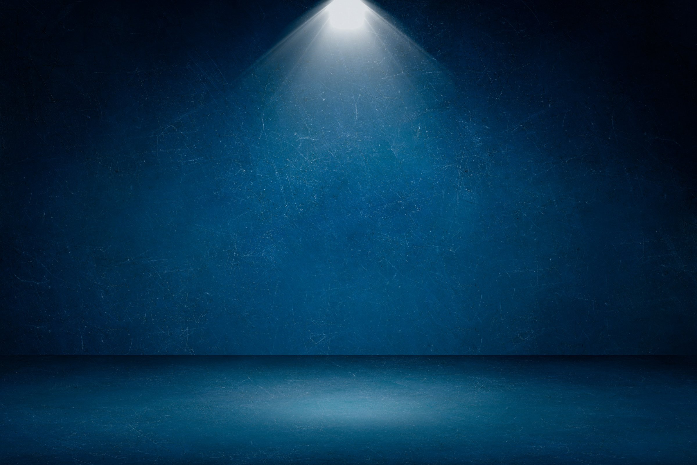 Blue plaster concrete grunge texture background with spotlight for use display product.